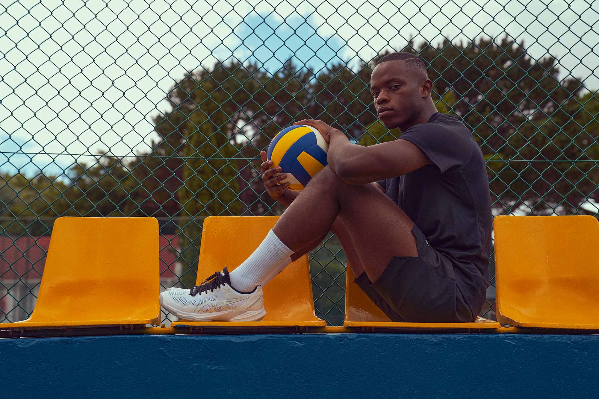 volleyball model posing in latest asics commercial volleyball photoshoot
