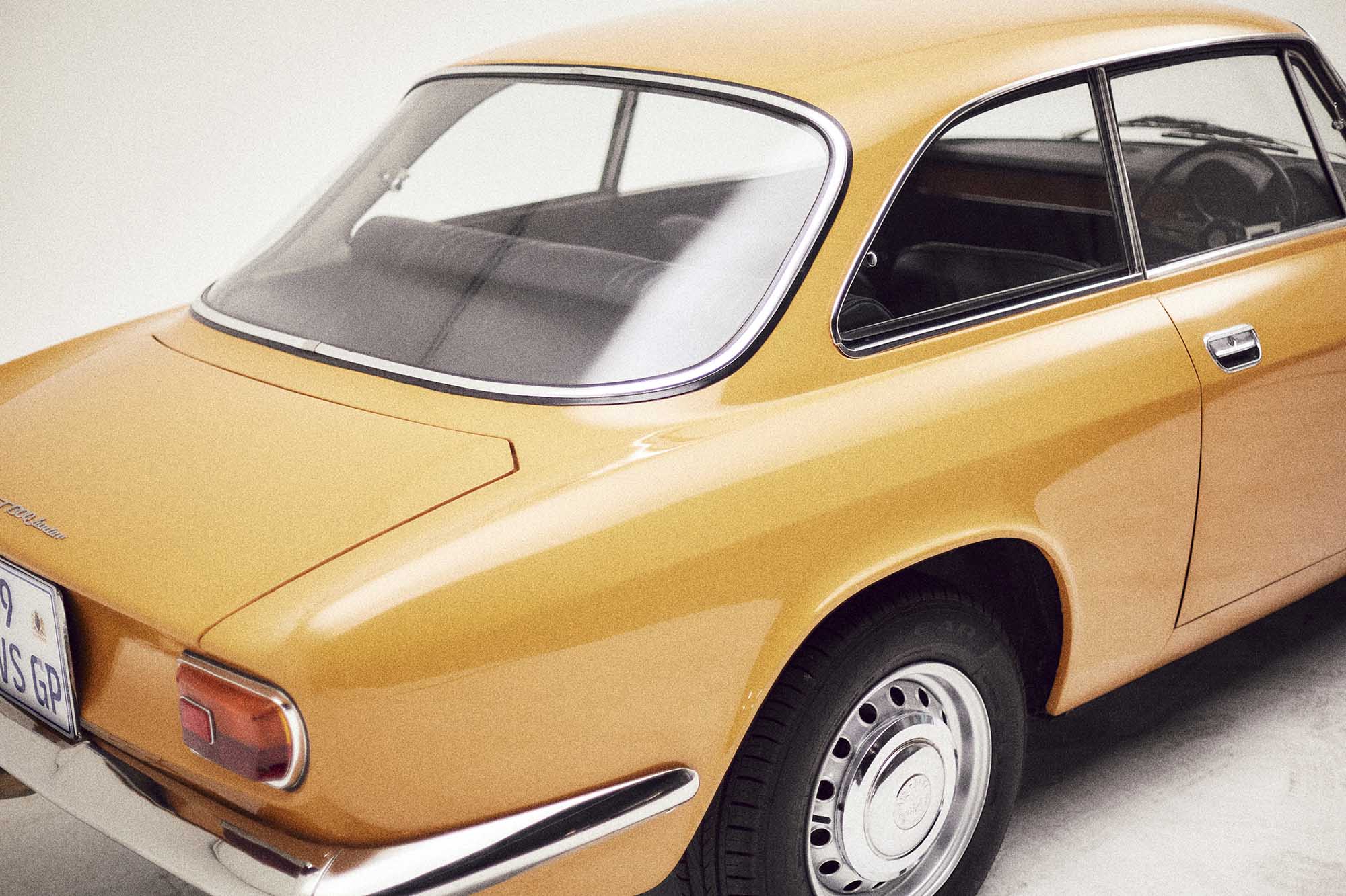 vintage gold alfa romeo shot in studio using sony alpha A1 capturing privates collectors car range